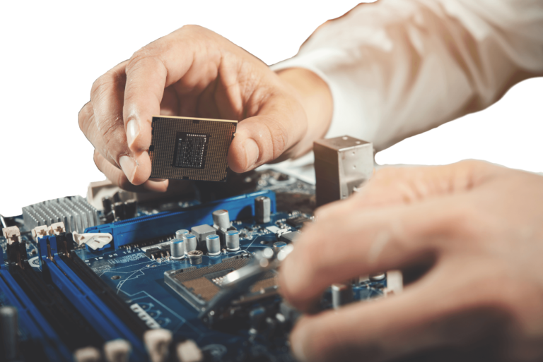 Technician installing a microprocessor